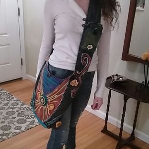 rising international hobo zipper bag